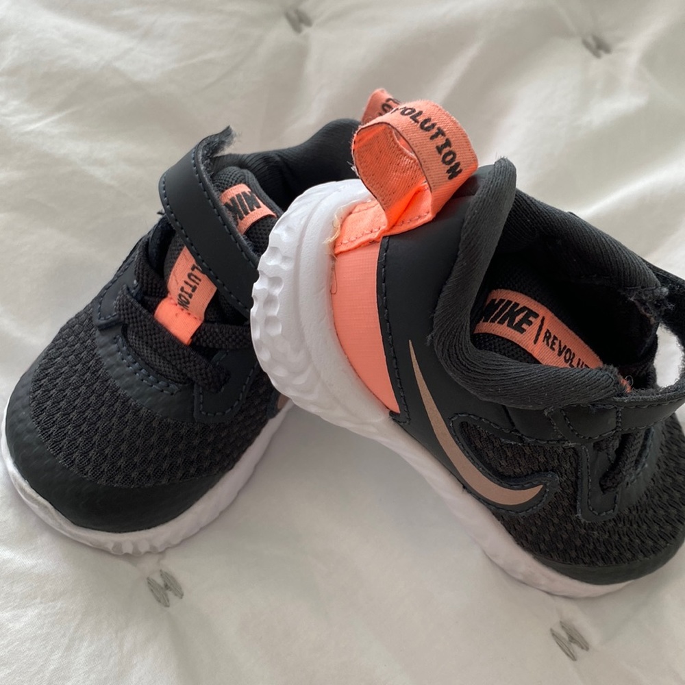 Baby Nike revolution sneakers black and coral